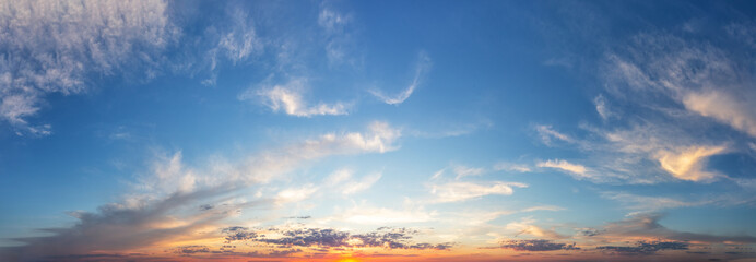 Sunset cloudy sky with orange sun - 274895583