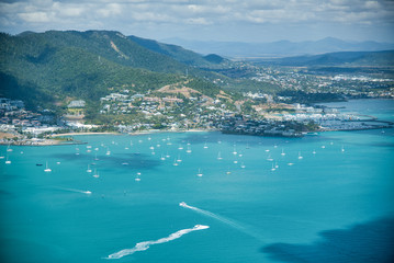 Obraz premium Aerial view of Airlie Beach coastline, Australia