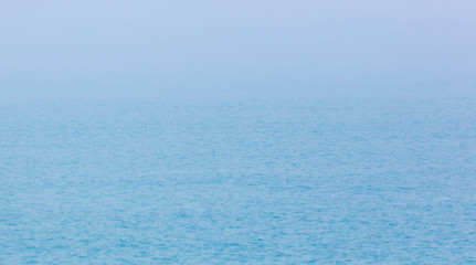 Expanse of water on the sea with a foggy horizon