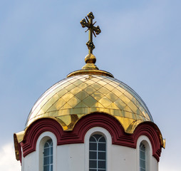 Fototapeta na wymiar Golden Cross on the Orthodox Church