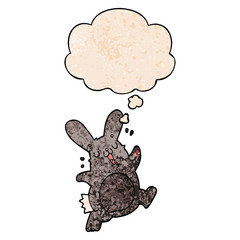 cartoon rabbit and thought bubble in grunge texture pattern style