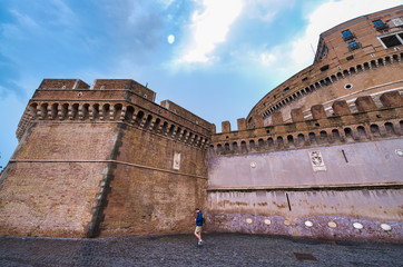 ROME, ITALY - JUNE 2014: Tourists visit Saint Angel Castle. The city attracts 15 million people...