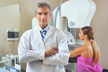 Woman undergoing breast xray under doctor supervision
