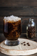 Cold frappuccino with cream and ice crumb