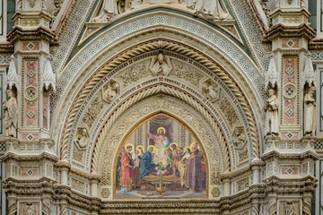 Fototapeta na wymiar A beautyful decorative panels at the Duomo Santa Maria del Fiore, in Florence, Italy