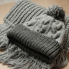 Close shot of cold weather winter handmade knitting clothes
