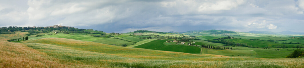 Panorama of Tuscan field and town of Pienza