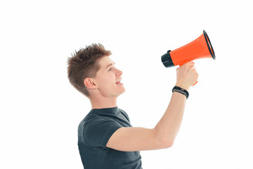 closeup.modern young man with a megaphone. isolated on a white background.