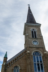 Fototapeta na wymiar Historic brick church with steeple