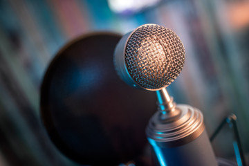 microphone on stage studio recording sound voice karaoke emitter bject musical singing conference performance talent equipment gear audience concert show live recital acoustic radio technology metal