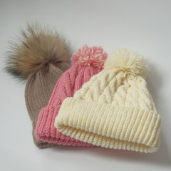 Close shot of cold weather winter handmade knitting clothes