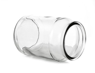Empty glass jar with aluminum lid over white background
