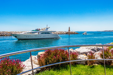 Luxury yacht enters Puerto Banus, Nueva Andalucia, Marbella, Province of Malaga, Andalusia Spain