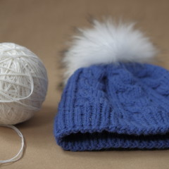 Close shot of cold weather winter handmade knitting clothes