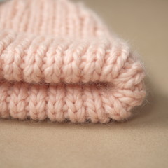 Close shot of cold weather winter handmade knitting clothes