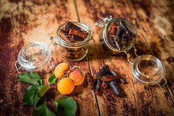 the sweetness of the apricot folded in jars tubes