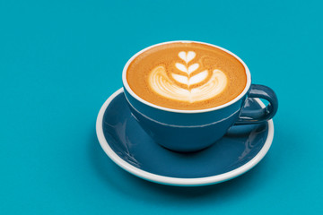 Coffee cup on blue background