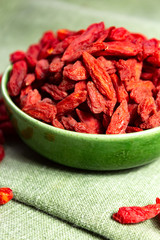 Healthy superfood, red dried goji chinese wolfberry berries, used in many snack foods and supplements, granola bars, yogurt, tea blends, fruit juice as whole berries or ground seeds, seed oil.
