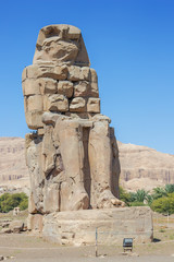 View of the east Colossus of Memnon in the vicinity of Luxor