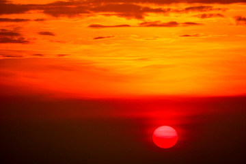 sunset on sky back soft evening cloud over horizon sea