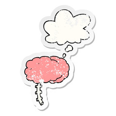 cartoon brain and thought bubble as a distressed worn sticker