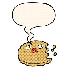 cartoon bitten cookie and speech bubble in comic book style