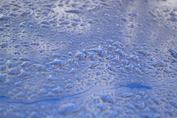 water drops on blue surface