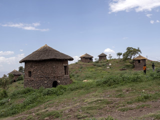 Fototapeta na wymiar Traditional lodges are located on the slopes, Lalibela, Ethiopia