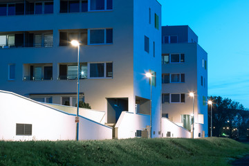 apartment quarter at night with modern LED street lights