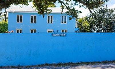 large blue building with a blue wall on Dunmore Street in the Bahamas