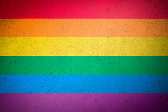 Gay Pride Background Of Rainbow Colors Painted On Full Frame Of Textured Wood