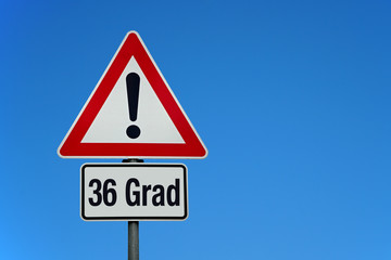 36 Grad mit Achtung Schild