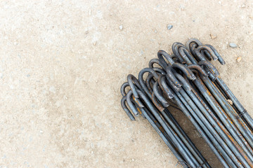 closeup steel bar in construction equipment with soft-focus and over light in the background