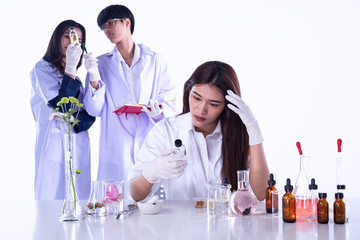 The scientists conducting experiments in laboratory,team of researchers in Chemical and nature organic extract,aromatic essential research in Lab test