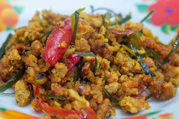 Pork with yellow curry paste. Local food in southern Thailand