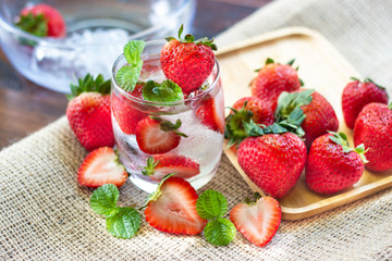 fresh Strawberry mohito cocktail with ice and mint in glass