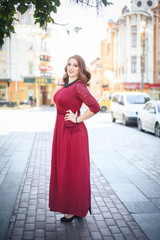 Fototapeta premium Young and beautiful woman in casual clothes in the street.