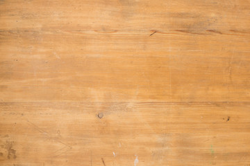 Natural wooden background. Scratches and scuffs on the surface of the wood