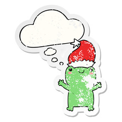 cute christmas frog and thought bubble as a distressed worn sticker