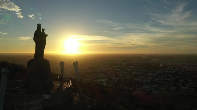 Aerial Drone Sunset View over Cerro de la Memoria and the Virgin in Los Mochis, Sinaloa, Mexico