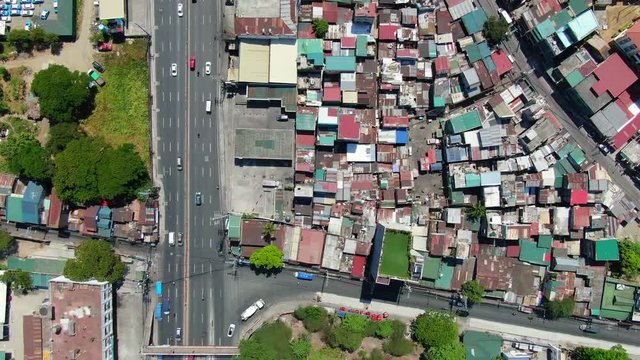 Top down view of the snuggled road through small houses.