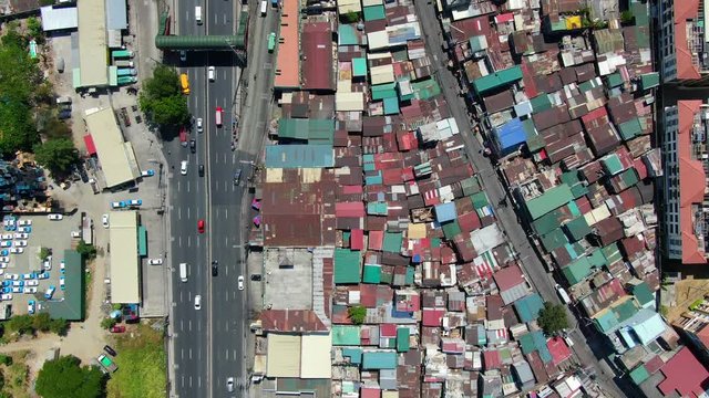 A top down view shows a main arterial road,houses and bridge.