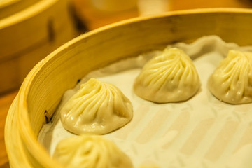 chinese Traditional style dumplings in bamboo tray display