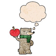 cartoon bear with apple and thought bubble in grunge texture pattern style