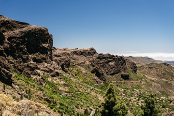 Fototapeta na wymiar Nature and landscape of the Gran Canaria. Rocky mountains range, valleys, ocean. 
