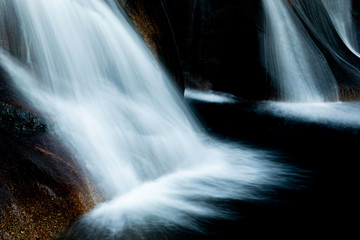 Obraz premium Beautiful waterfall and big rocks