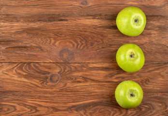 Three green apples