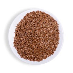flax seeds in plate on white background isolation