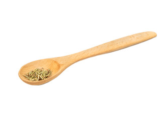 Dry rosemary in a spoon