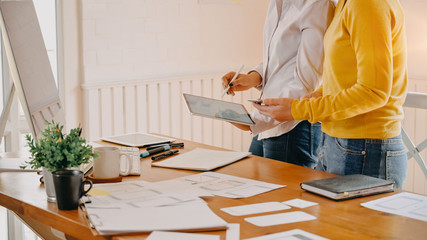 Snap shot web designer working on office desk, Website wireframe sketch by development.